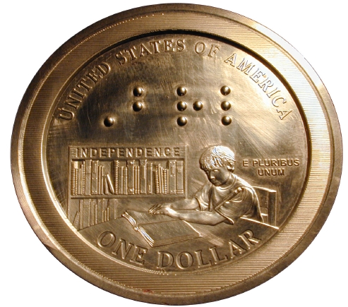 The reverse of the Braille commemorative silver dollar