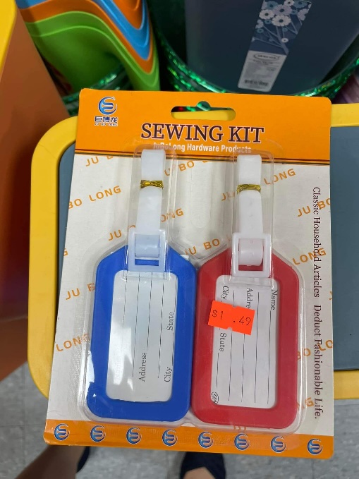 Luggage tags with (hidden) sewing kit